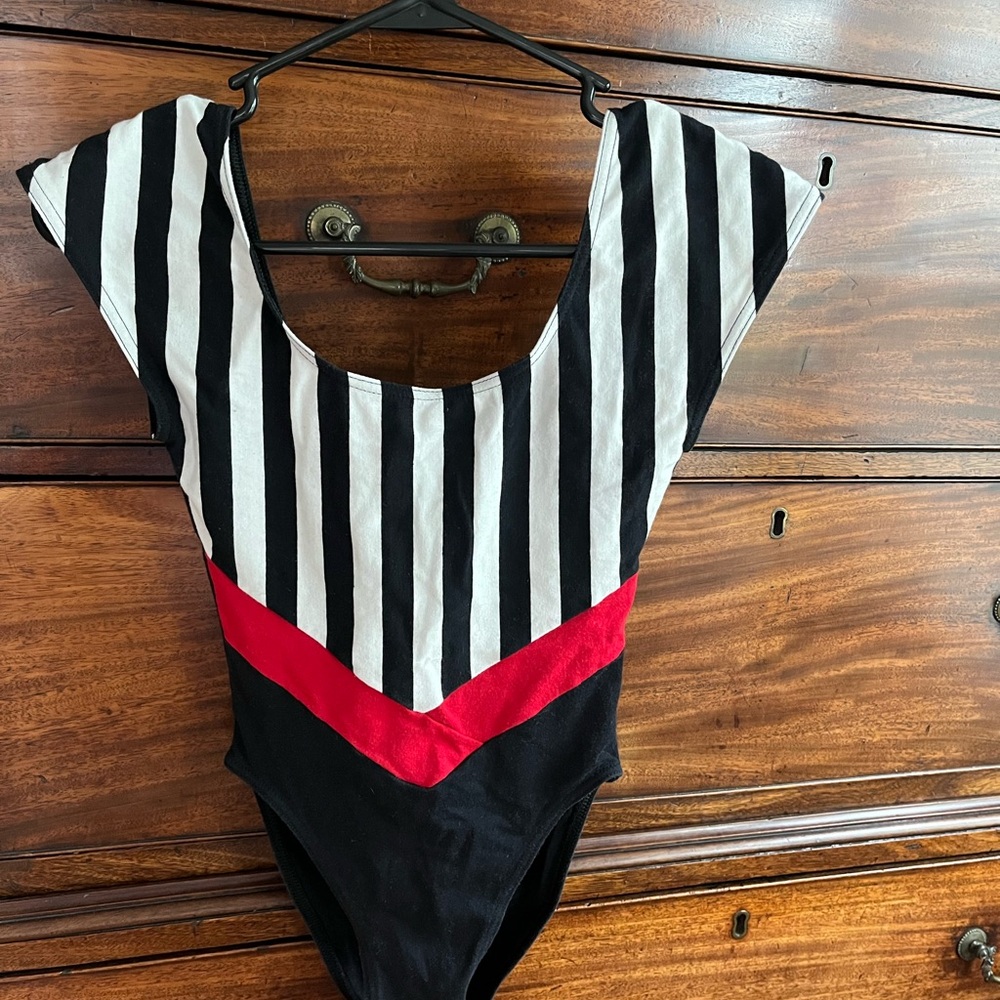 Black and White Striped Bodysuit with Geometric Design